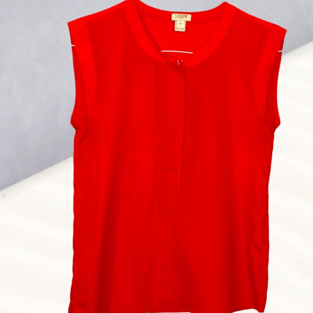 Red sleeveless blouse